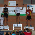 Alberto, en lo más alto del podio junto a Rabanal y Caminero.