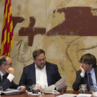 El portavoz del Govern, Jordi Turull, el vicepresident Oriol Junqueras y el president, Carles Puigdemont.