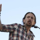 El secretario general de Podemos, Pablo Iglesias, en un mitin en Alcalá de Henares (Madrid), este viernes, 8 de mayo.
