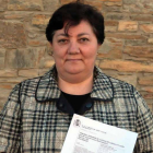 La viuda de la víctima, con la sentencia en mano