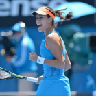 La tenista serbia Ana Ivanovic celebra un tanto frente a la estadounidense Serena Williams en el Abierto de Australia.