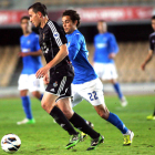 Marquitos pugna con Alán Baró en una acción del Xerez-Deportiva de esta temporada.