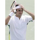 Federer se echa las manos a la cabeza, tras un tanto frente a Ljubicic