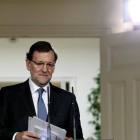 El presidente del Gobierno, Mariano Rajoy, durante la conferencia de prensa que ofreció hoy en el Palacio de la Moncloa, tras la última reunión del año del Consejo de Ministros, en la que ha hecho un balance político y económico de 2013.