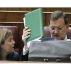 Mariano Rajoy, junto a la portavoz del PP en el Congreso, Soraya Sáenz de Santamaría.