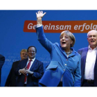 Merkel, en la sede la la CDU, en Berlín, tras conocer los sondeos que le otorgaban la victoria electoral, este domingo.