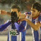 Jano y David Álvarez celebran el gol del primero ante el Racing de Ferrol.