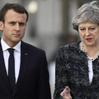 El presidente de Francia, Emmanuel Macron (izquierda), y la primera ministra británica, Theresa May.