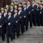 Agentes de seguridad chinos en formación a las afueras del Gran Palacio del Pueblo.