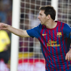Messi celebra uno de los dos goles que logró ante el Racing de Santander.