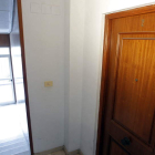 Puerta de la vivienda en la calle del Riu Magre de Guadassuar donde murió una mujer.