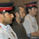 Pedro Jiménez durante el juicio, flanqueado por dos Mossos d'Esquadra