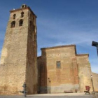 Torre de la iglesia de San Millán de los Caballeros, santo y seña de la localidad.