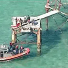 Imagen de la CBS del momento en que la Guardia Costera detuvo a los inmigrantes, en el faro American Shoal, el pasado mayo en aguas del Estrecho de Florida.