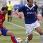 Carlos Ruiz (derecha), en un partido con el Melilla de esta temporada.