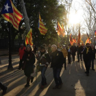 Manifestantes independentistas se dirigen a la concentración convocada por la ANC con motivo de la sesión constitutiva del Parlament.