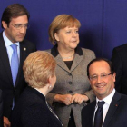 La cancillera Angela Merkel (centro), durante la foto de familia de los líderes de la UE, el jueves en Bruselas.