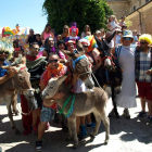 Los participantes en la carrera de burros de Boñar
