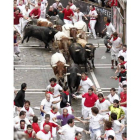 Los toros de la ganadería gaditana de Torrestrella durante el primer encierro de 2011