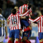 Los jugadores del Atlético celebran uno de sus goles.