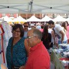 Tomás Gallego y Piedad del Río recorren los puestos tras inaugurar la feria.