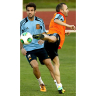 Fábregas e Iniesta, durante un entrenamiento con España.