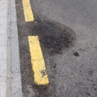 Una de las imágenes del estado del asfalto en los barrios de León. DL