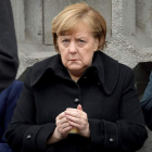 Merkel, en el aniversario del atentado islamista en el que murieron doce personas en Berlín. C. BILAN