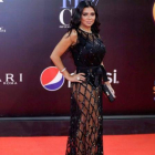La actriz egipcia Rania Yussef posa en la alfombra roja del Festival de Cine de El Cairo.