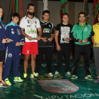 Los cintos de plata para los Campeones senior del 2014.