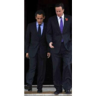 Sarkozy y Cameron, durante la cumbre.