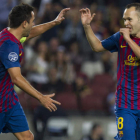 Iniesta celebra con Xavi Hernández su gol ante el Viktoria.