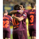 Los dos proragonistas de la noche: Messi y Suárez abrazados tras el gol del argentino. CASTELLÓ