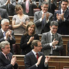 Mariano Rajoy recibe el aplauso de los diputados populares tras su primera intervención.