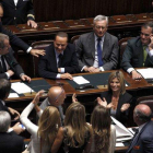 Berlusconi es felicitado por sus diputados tras la votación de la moción de confianza.