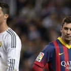 Cristiano Ronaldo y Leo Messi, en el Bernabéu, el pasado 23 de marzo, en el último clásico liguero de la temporada 2013-2014.