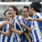 Coloccini celebra su gol, segundo del Dépor, junto a sus compañeros