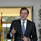 El presidente del Gobierno, Mariano Rajoy, durante la conferencia de prensa que ofreció hoy en el Palacio de la Moncloa tras la última reunión del año del Consejo de Ministros en la que ha hecho un balance político y económico de 2013.