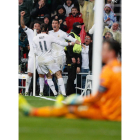 El delantero portugués del Real Madrid Cristiano Ronaldo celebra su tercer gol y tercero del equipo ante el Wolfsburgo alemán. J. MARTÍN