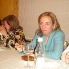 Maribel Lorenzana, en el centro, durante la cena de las mujeres trabajadoras