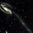 La galaxia «Renacuajo» en pleno proceso de fusión con otra más pequeña