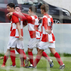 Los jugadores arlequinados celebran uno de los goles materializados.