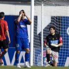 Los jugadores del Getafe se lamentan después de marrar una ocasión