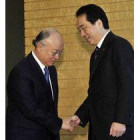 El director del Organismo Internacional de la Energía Atómica, Yukiya Amano, con Naoto Kan.