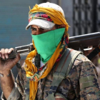 Un combatiente de las Fuerzas Democráticas de Siria el pasado mes de agosto en la localidad de Manbij.