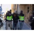 Uno de los detenidos por la policía, hoy, en Ceuta, acusado de terrorismo