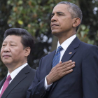 Xi Jinping y Obama escuchan el himno de EE UU.