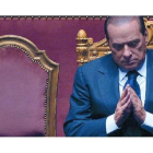 Pensativo 8 Silvio Berlusconi, tras una intervención en el Senado italiano cuando todavía era primer ministro, a finales del 2010.