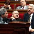 Maragall, Lluís Carod-Rovira y Joan Saura durante el primer pleno del Parlament en esta legislatura
