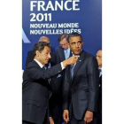 Sarkozy conversa con su homólogo Obama.